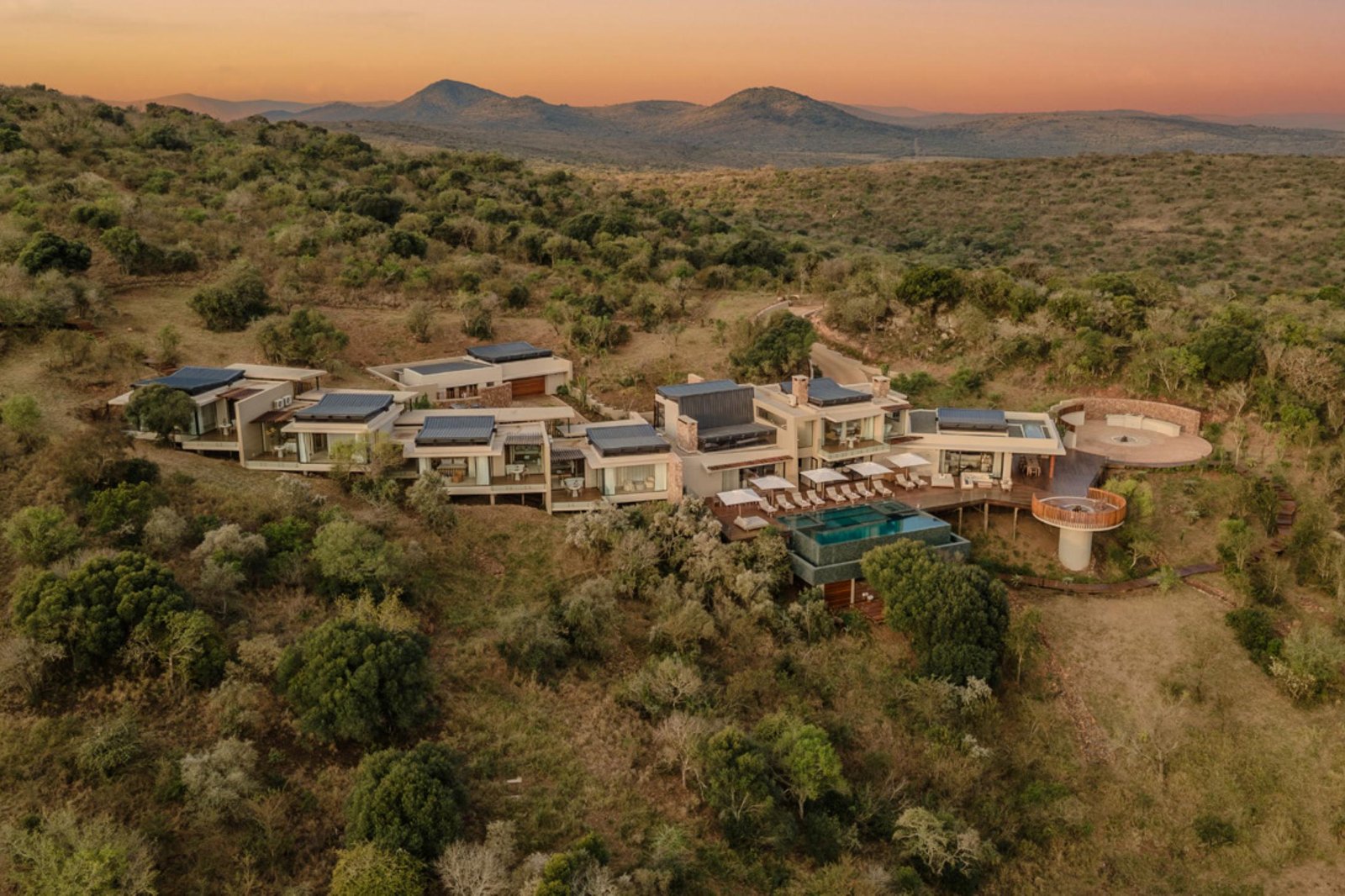 Villa Thandawena at dusk on its ridge above the Thanda Safari reserve