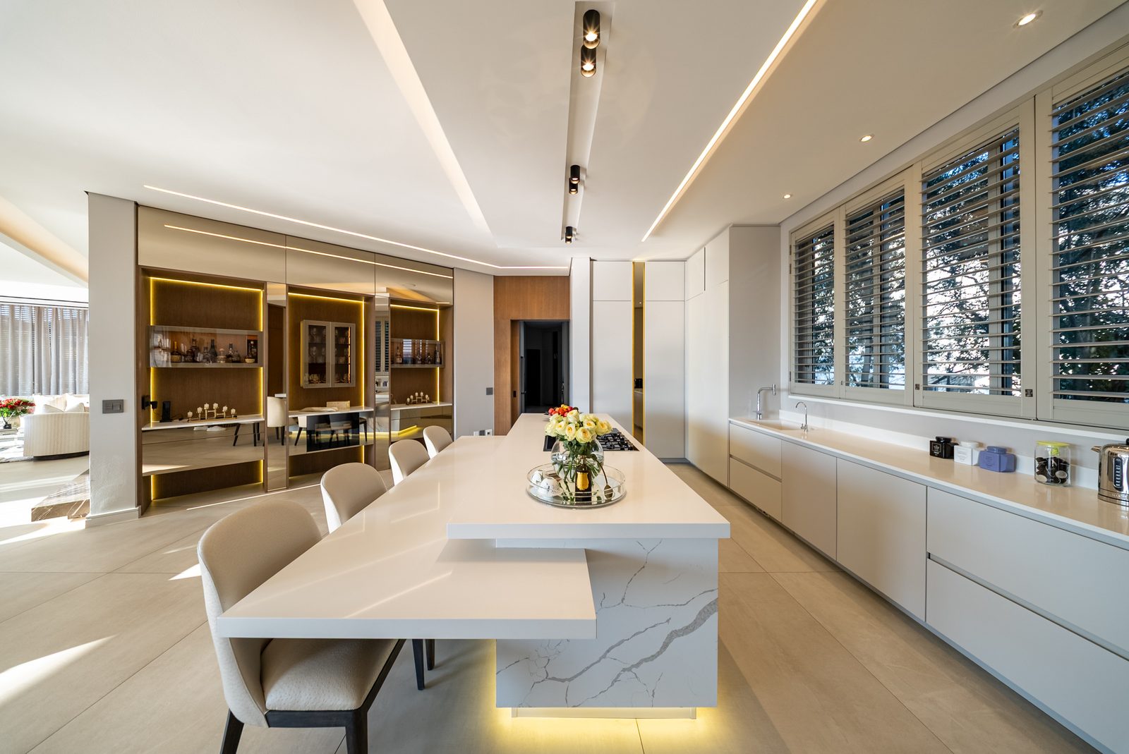 The kitchen with its lit marble centre island