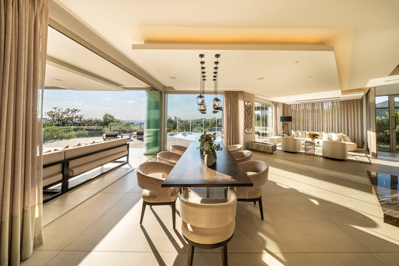 Stacking doors joining the dining room to the terrace