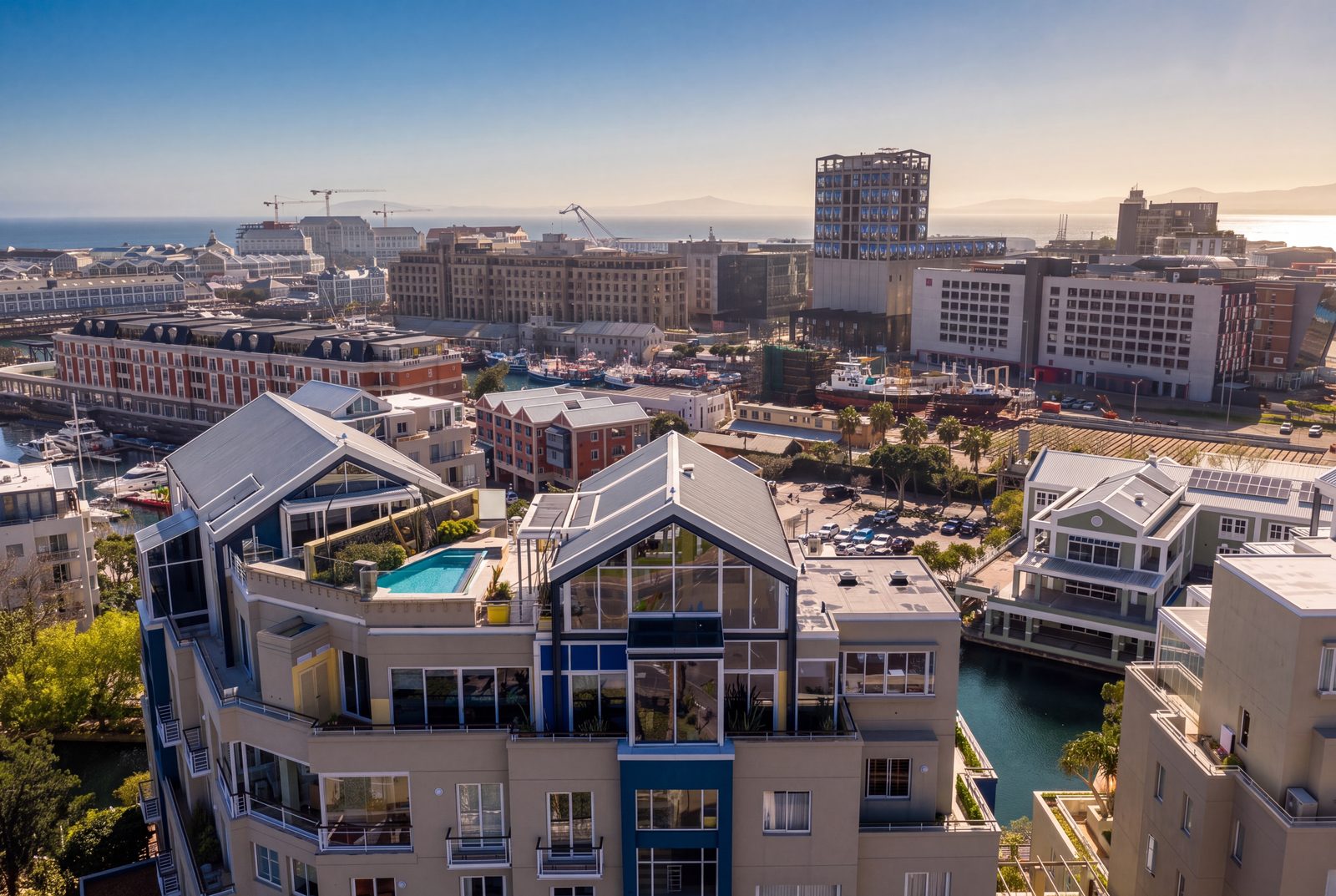 The penthouse from the air, crowning the marina, the working harbour and the Zeitz MOCAA beyond